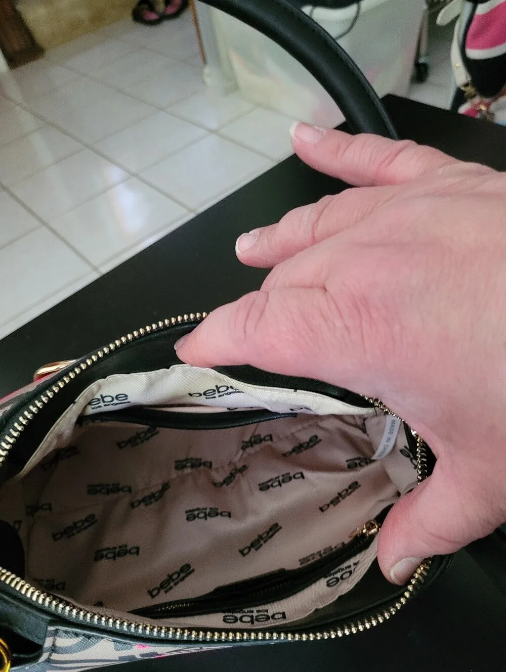 Bebe Women’s Patterned Top-Handle Bag in Black and Pink